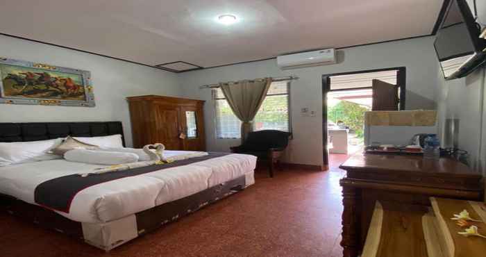 Bedroom EXPRESS O 91590 Guest House Pondok Puspa Ayu