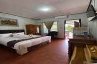 Bedroom EXPRESS O 91590 Guest House Pondok Puspa Ayu