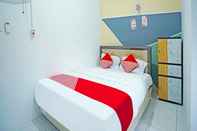 Kamar Tidur OYO 91559 Kost Bangau Syariah