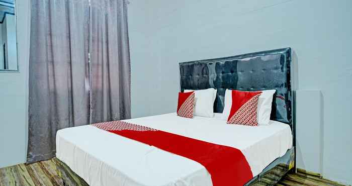 Bedroom OYO 91562 Hotel & Cafe Angkasa Golat