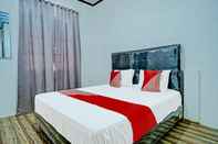 Bedroom OYO 91562 Hotel & Cafe Angkasa Golat