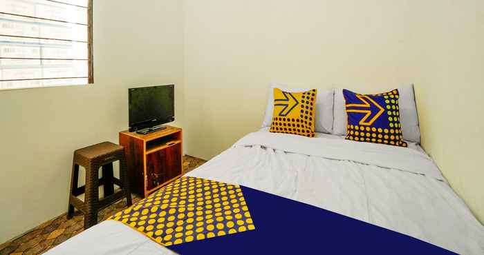 Kamar Tidur SPOT ON 91615 Arumba Guest House Syariah