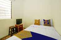 Kamar Tidur SPOT ON 91615 Arumba Guest House Syariah