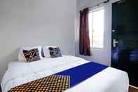 Kamar Tidur SPOT ON 91598 Oklahoma Homestay Syariah