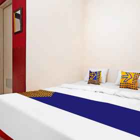 Bedroom1SPOT ON 91602 Red House Rents Syariah,Gedung Serba Guna (GSG)飯店