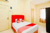 Kamar Tidur OYO 91632 Harmonie Homestay