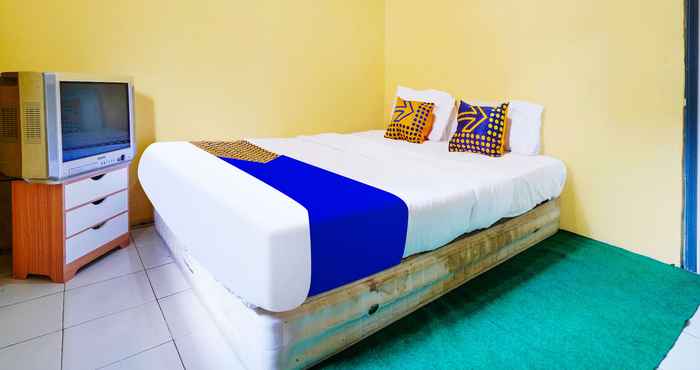 Kamar Tidur SPOT ON 91638 Anna Homestay Syariah