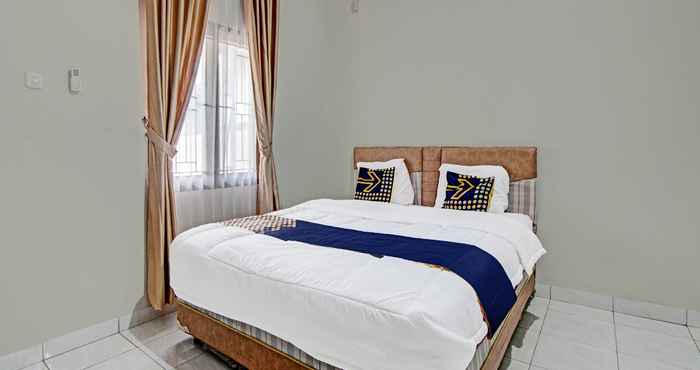 Kamar Tidur SPOT ON 91645 Rifki Homestay Syariah