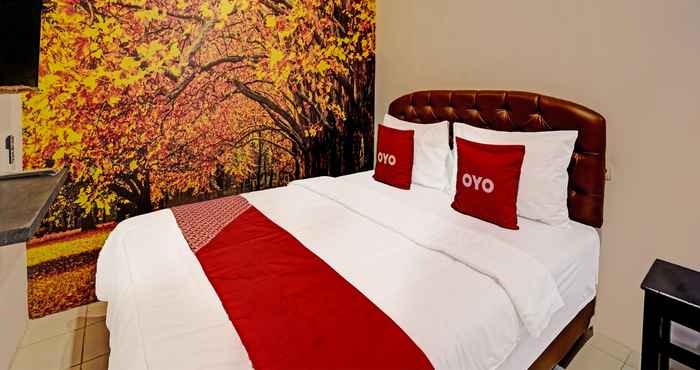 Bedroom SUPER OYO 91618 Hotel Nawangwulan