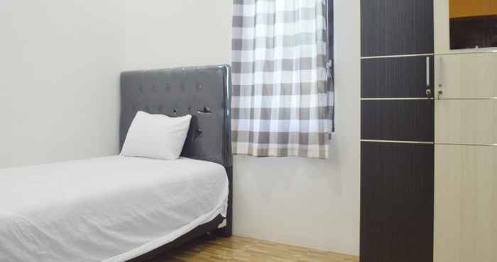 Kamar Tidur SPOT ON 91616 Kharisma Guest House