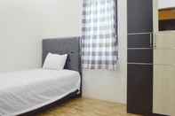 Bedroom SPOT ON 91616 Kharisma Guest House
