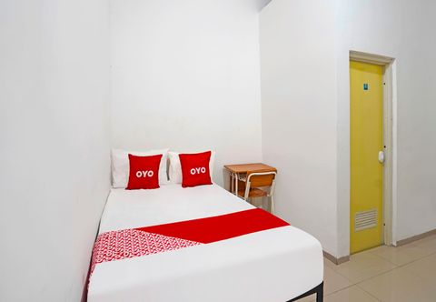 Bedroom OYO 91670 Mannsur Homestay Syariah