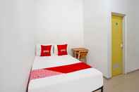 Bedroom OYO 91670 Mannsur Homestay Syariah