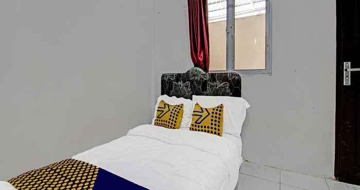 Bedroom SPOT ON 91699 Homestay Hj Lela Syariah