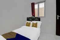 Bedroom SPOT ON 91699 Homestay Hj Lela Syariah