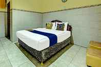 Bedroom SPOT ON 91677 Hotel Citra Dewi 3