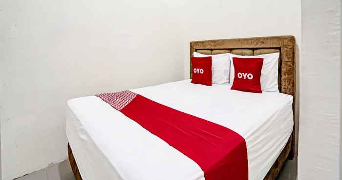 ห้องนอน OYO 91653 Grand Syariah Hagawa Lamongan 