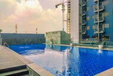 Swimming Pool Classic and Modern 1BR at Evenciio Apartment By Travelio