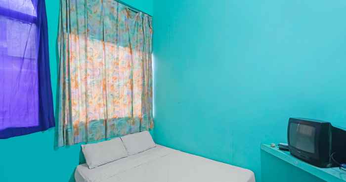 Kamar Tidur SPOT ON 91732 Rani Homestay Syariah