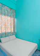 BEDROOM SPOT ON 91732 Rani Homestay Syariah