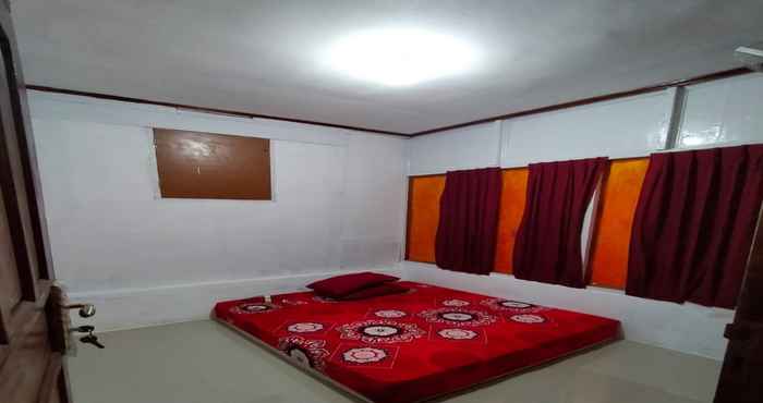 Bedroom EXPRESS O 91702 Mandeh Homestay Syariah