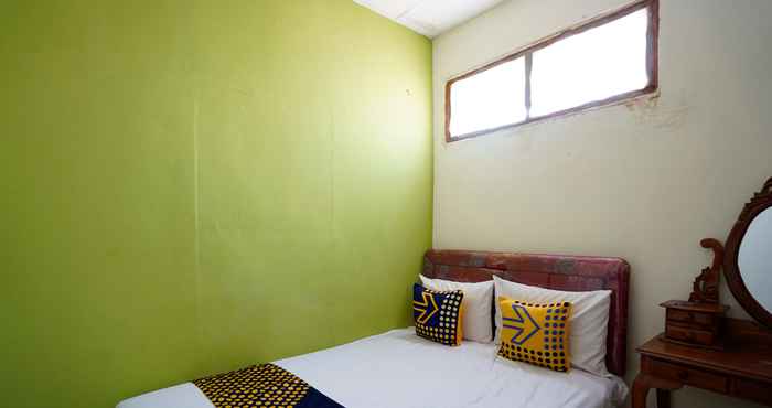 Kamar Tidur SPOT ON 91716 Kost Yy Syariah