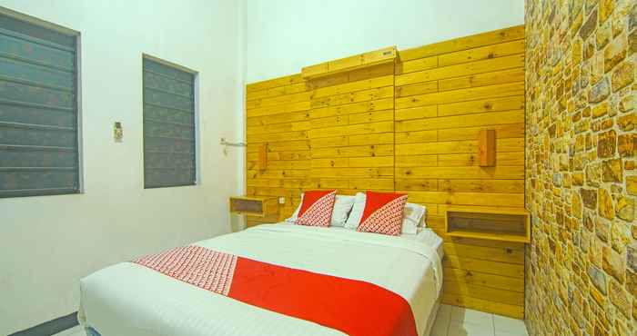 Bedroom OYO 91730 De' Mande Homestay Syariah