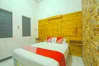 Bedroom OYO 91730 De' Mande Homestay Syariah