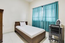 臥室 SPOT ON 91770 441 Pemuda Homestay