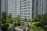 Exterior 2BR Cozy Apartment at M-Town Residence near Summarecon Mall By Travelio