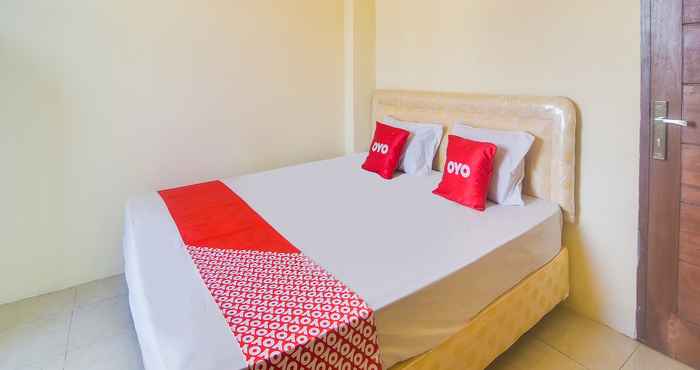 Phòng ngủ OYO 91755 Priska Kost Dan Homestay