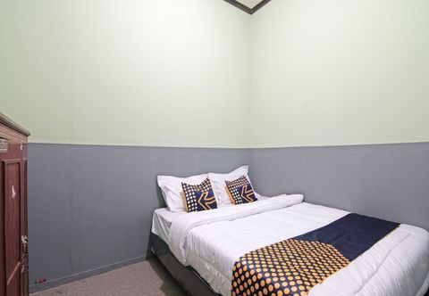 Bedroom SPOT ON 91761 Ramah Tamah Homestay Syariah