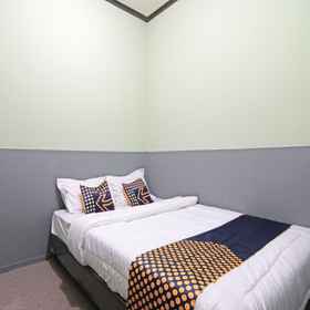 Bedroom 1 SPOT ON 91761 Ramah Tamah Homestay Syariah, Giant Ekstra Tuanku Tambusai Hotels