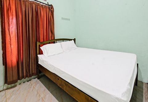 Bedroom SPOT ON 91771 Homestay Bang Haji