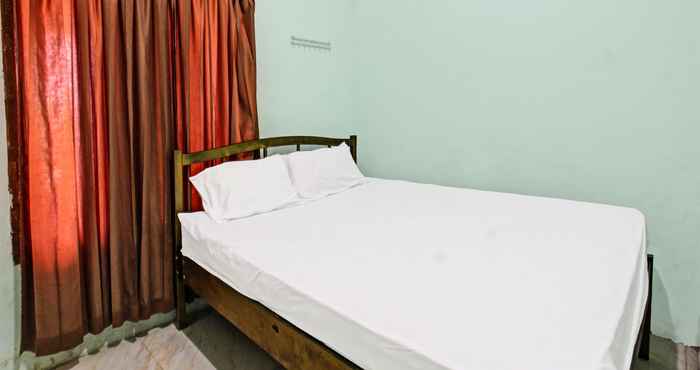 Bedroom SPOT ON 91771 Homestay Bang Haji