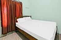 Kamar Tidur SPOT ON 91771 Homestay Bang Haji