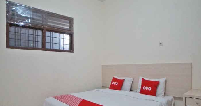 ห้องนอน OYO 91776 Bina Family Homestay