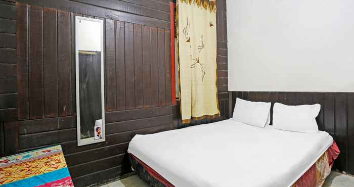 Bedroom SPOT ON 91793 Maila Homestay 