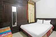 Bedroom SPOT ON 91793 Maila Homestay 