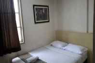 Bedroom EXPRESS O 91674 Penginapan Bm Prima