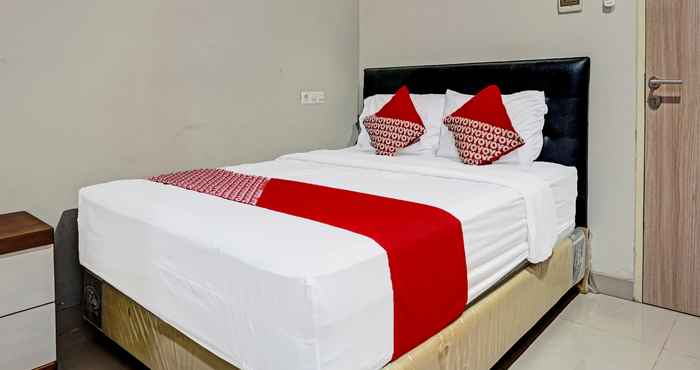 Kamar Tidur OYO 91812 Nh Kost Syariah