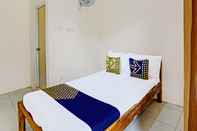Bedroom SPOT ON 91824 Rumah Kaloka Syariah
