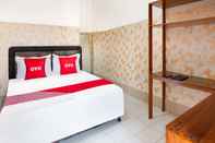 Kamar Tidur OYO 91827 Tutus Homestay Syariah