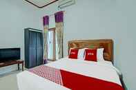 ห้องนอน OYO 91852 Prima Guesthouse Syariah