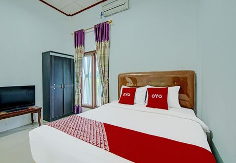 Kamar Tidur OYO 91852 Prima Guesthouse Syariah