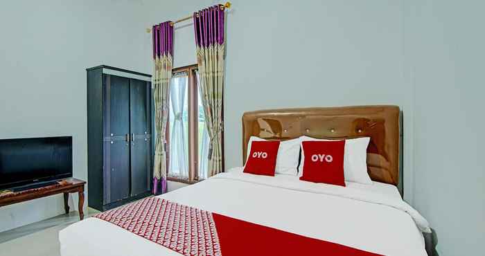 Bedroom OYO 91852 Prima Guesthouse Syariah