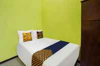 Bedroom SPOT ON 91869 Insan Mulia Kost Syariah