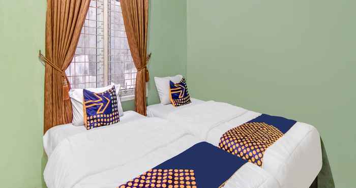 Kamar Tidur SPOT ON 91875 Nayla Homestay Syariah