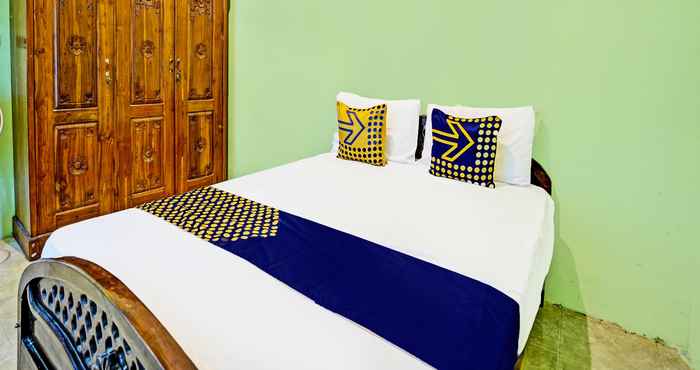 Bedroom SPOT ON 91868 Nusa Indah Guest House Syariah