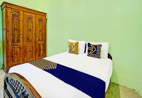 Bedroom SPOT ON 91868 Nusa Indah Guest House Syariah
